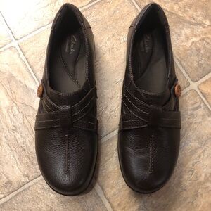 Dark brown leather Clark’s shoes